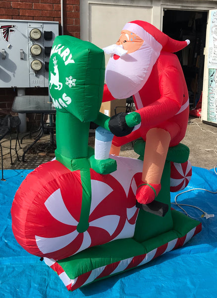 5.5 ft. LED Santa on Stationary Bike Christmas Inflatable - Like New!