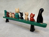 Hand-Painted Animals on a Bench