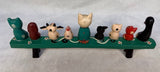 Hand-Painted Animals on a Bench