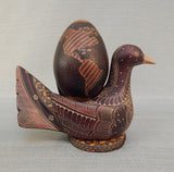 Hand-Painted Wooden Bird with World Egg