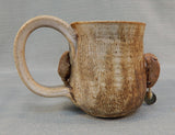 Face Mug with Earring by L. Chris