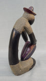 Carved Stone Figure - Man Playing Drum