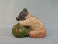 Asian Wood Figure of Girl Sleeping on a Pumpkin