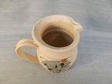 Ceramic Pitcher and Plate Set