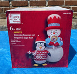 6 ft. LED Animated Shiverning Snowman and Penguin on Sugar Rush Inflatable - Like New!